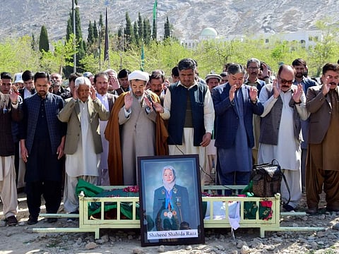 Relatives and mourners attend funeral prayers for female field hockey player Shahida Raza, who died in the shipwreck tragedy, in Quetta, Pakistan, Friday, March 17, 2023.