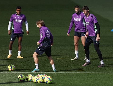 (From left) Real Madrid's Rodrygo, Luka Modric, Karim Benzema and Thibaut Courtois attend a training session at the Ciudad Real Madrid training complex in Valdebebas, outskirts of Madrid on the eve of the Spanish league 'El Clasico' match against Barcelona.