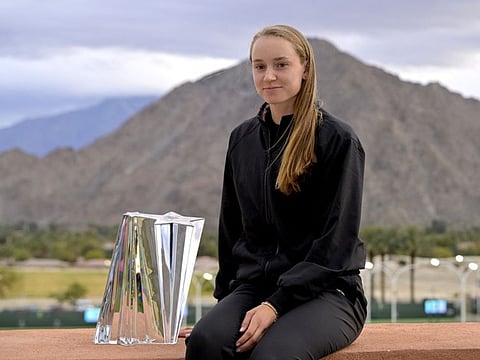 Elena Rybakina with the Indian Wells trophy after defeating Aryna Sabalenka in the women’s final on Sunday.