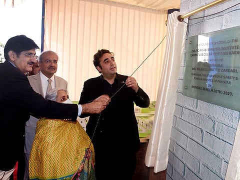 Pakistan Foreign Minister Bilawal Bhutto Zardari and Sindh Chief Minister Syed Murad Ali Shah unveil a plaque to start construction of Pakistan's largest cardiac hospital in Karachi on Monday, March 20, 2023.