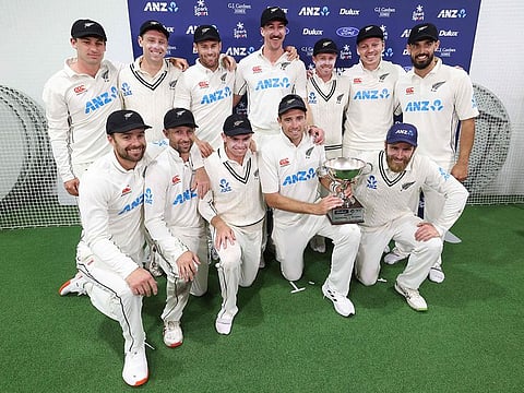 New Zealand's captain Tim Southee holds the Test series trophy during day four of the second cricket Test match between New Zealand and Sri Lanka at the Basin Reserve in Wellington.
