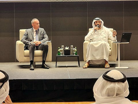 Abdullah Al Marri, UAE Minister of Economy, discusses economic diplomacy with Nikolay Mladenov, director general of the Anwar Gargash Diplomatic Academy, during a talk in Abu Dhabi in Tuesday