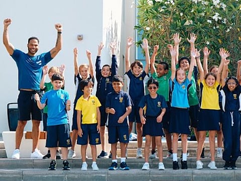 Man City legend Joleon Lescott (left) took part in the Healthy Lifestyle programme at Cranleigh Abu Dhabi to help educate kids on health and fitness.