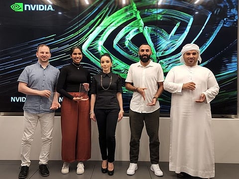 Chantelle Tavid, Head of Marketing, NVIDIA MENAT (center) with the competition winners at NVIDIA Studio