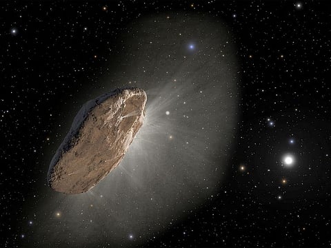 This artist's illustration shows the wayward interstellar visitor 'Oumuamua (pronounced oh-MOO-ah-MOO-ah) racing toward the outskirts of our solar system.