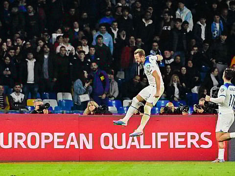England's forward Harry Kane (centre) celebrates after scoring a penalty and his side's second goal during the UEFA Euro 2024 Group C qualifier against Italy.