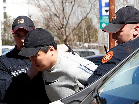 South Korean cryptocurrency entrepreneur co-founder of Terraform Labs (Terra Luna), Do Kwon (C) is taken to court after being arrested at the airport on March 24, 2023 in Podgorica.