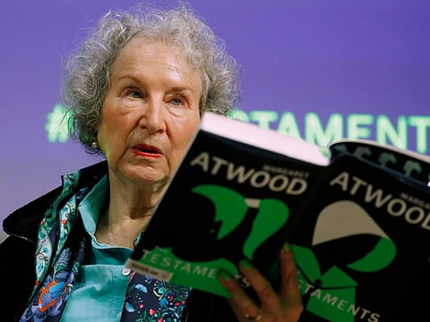 File photo of Canadian author Margaret Atwood with a copy of her book 'The Testaments'.