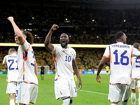 Belgium's Romelu Lukaku (centre) celebrates after the match.