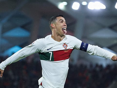 Portugal's forward Cristiano Ronaldo celebrates after scoring his team's first goal during the UEFA Euro 2024 group J qualification match against Luxembourg at the Stade de Luxembourg, in Luxembourg.