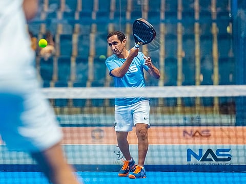 Sheikh Saeed Bin Maktoum Bin Juma Al Maktoum, President of the UAE Padel Association, in action during the NAS Sports Tournament.