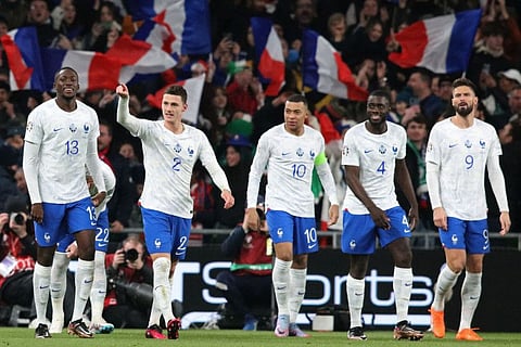 France's defender Benjamin Pavard (second left) celebrates with teammates after scoring in the UEFA Euro 2024 group B qualification match against Republic of Ireland at Aviva Stadium in Dublin, Ireland.
