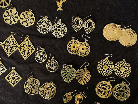 Jewelry made from bullet shells are displayed at Angkor Bullet Jewelry in Phnom Penh, Cambodia, on March 29, 2023.