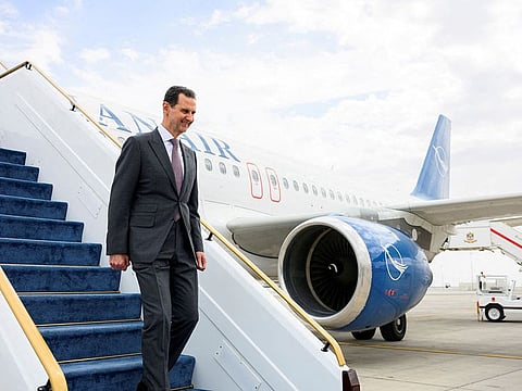 Syria's President Bashar al-Assad arrives at the Presidential Airport in Abu Dhabi, March 19, 2023
