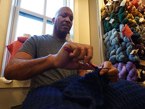 Michael Manning, a retired federal government worker, attends a gathering of DC Men Knit in Alexandria, Virginia.