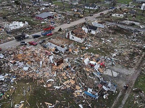 Destroyed and damaged homes are seen on the southern side of the city the day after a tornado hit Sullivan, Indiana, US.