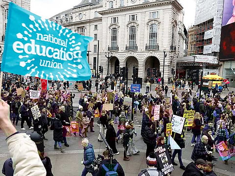 Teachers attend a march during strike action in a dispute over pay, in London, Britain March 15, 2023.