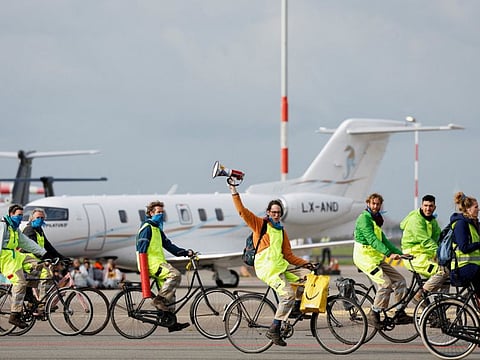 Climate activists protest against environmental pollution from aviation at Amsterdam's Schiphol Airport, in Schiphol, Netherlands November 5.