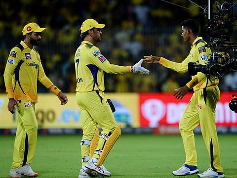 Chennai Super Kings' captain Mahendra Singh Dhoni (centre).