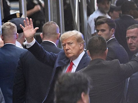 Former US president Donald Trump arrives ahead of his arraignment at the Manhattan Federal Court in New York City on April 4, 2023.