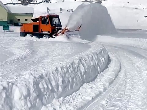 Border Roads Organisation (BRO) clearing the thick layer of snow from JNM Road to ensure movement of vehicles, in East Sikkim.