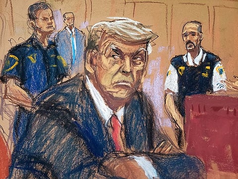 Former US President Donald Trump appears in court for an arraignment on charges stemming from his indictment by a Manhattan grand jury following a probe into hush money paid to porn star Stormy Daniels, in New York, on April 4, 2023, in this courtroom sketch.