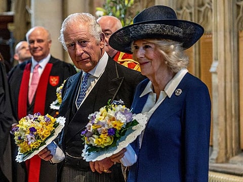 Britain's King Charles III (L) and Britain's Camilla, Queen Consort (R)