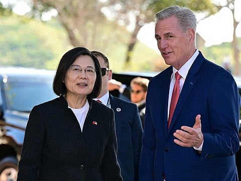 US Speaker of the House Kevin McCarthy speaks with Taiwan President Tsai Ing-wen while arriving for a bipartisan meeting at the Ronald Reagan Presidential Library in Simi Valley, California, on April 5, 2023.