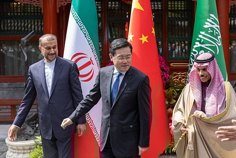 Iranian Foreign Minister Hossein Amir-Abdollahian, Saudi Arabia's Foreign Minister Prince Faisal bin Farhan Al Saud and Chinese Foreign Minister Qin Gang during their meeting in Beijing, China, April 6, 2023.