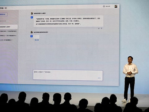 Baidu's co-founder and Chief Executive Officer (CEO) Robin Li showcases artificial intelligence powered chatbot known as Ernie Bot by Baidu.