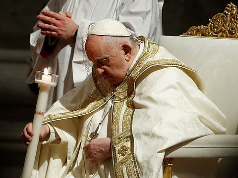 Pope Francis presides over the Easter Vigil in Saint Peter's Basilica at the Vatican.
