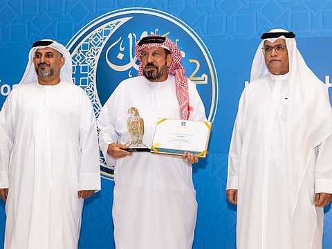 Abdulla Rasheed, Abu Dhabi Editor, Gulf News, with officials from the Abu Dhabi Chamber of Commerce and Industry.