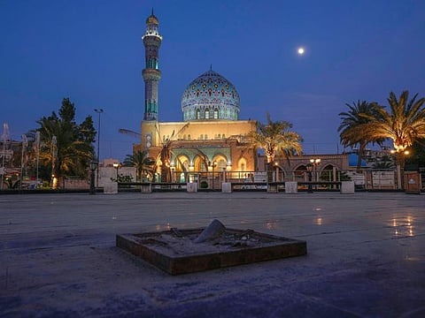 Firdous Square in Baghdad where American marines took down a statue of former Iraqi President Saddam Hussein in April 2003 is seen in Baghdad, Iraq, Tuesday, April. 4, 2023. In the background is the 14th of Ramadan Mosque.
