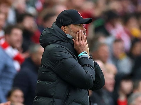 Liverpool manager Juergen Klopp reacts after Mohamed Salah misses a penalty kick against Arsenal at Anfield.