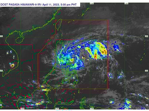 Satellite photo shows a low-pressure area has gain strength and turned into a tropical depression 'Amang', now moving towards eastern Philippines on Tuesday, April 11, 2023.