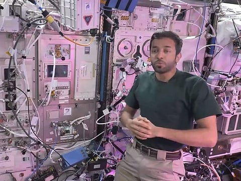 Still from clip showing Sultan Al Neyadi onboard the International Space Station explaining the experiment