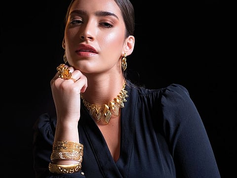 Front open blouse Dh99, LC Waikiki. JEWELLERY: Turkish-finish 22K gold necklace, earrings, bangles and rings, POR, all by Sky Jewellery