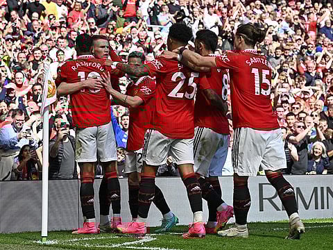 File photo: Manchester United's midfielder Scott McTominay (2L) celebrates scoring the opening goal during the English Premier League football match against Everton at Old Trafford in Manchester, north west England, on April 8, 2023.