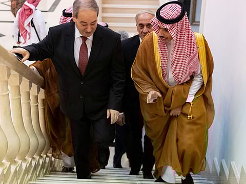 Saudi Foreign Minister Prince Faisal bin Farhan bin Abdullah (right) with Syrian Minister of Foreign Affairs and Expatriates Faisal Mekdad in Jeddah on April 12, 2023.