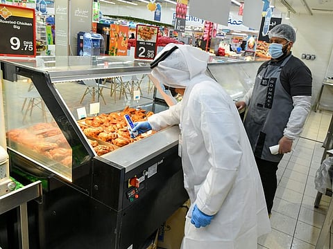Abu Dhabi Agriculture and Food Safety Authority inspectors during food inspection campaign