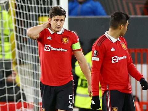 Manchester United's Harry Maguire reacts after scoring an own goal and Sevilla's second during the Europa League quarterfinal first leg at Old Trafford on Thursday.