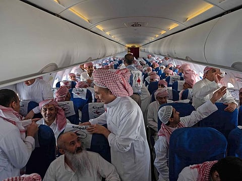 Freed Houthi prisoners awaiting take off on board a plane.
