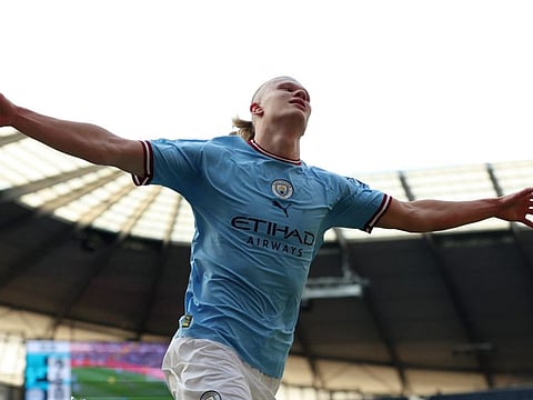 Manchester City's Erling Haaland celebrates after scoring against Leicester.