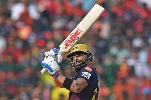 Royal Challengers Bangalore's Virat Kohli plays a shot during the Indian Premier League match against Delhi Capitals at the M Chinnaswamy Stadium in Bengaluru.