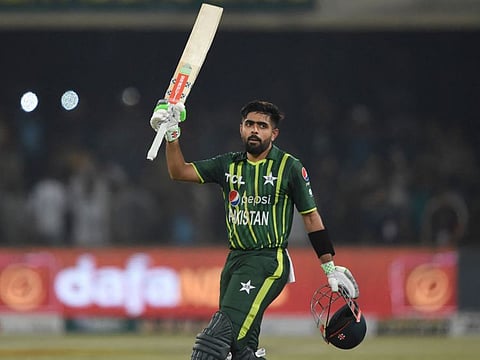 Pakistan's captain Babar Azam celebrates his century during the second Twenty20 cricket match against New Zealand at the Gaddafi Cricket Stadium in Lahore.