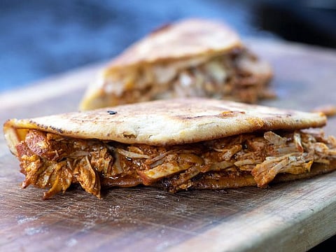 Pictured above are Arepas. In the Andean region of Colombia, you’ll find dishes made from rice, corn, potato, tapioca, chicken, and beef. There is something different in every region of Colombia