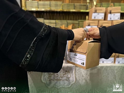 Female personnel take care of women I'tikaaf worshippers during Ramadan at the Prophet's Mosque.