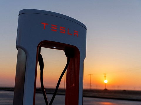 FILE PHOTO: A Tesla supercharging station is seen in the early morning sun, in Kettleman City, California, U.S., January 25, 2023. REUTERS/Mike Blake/File Photo