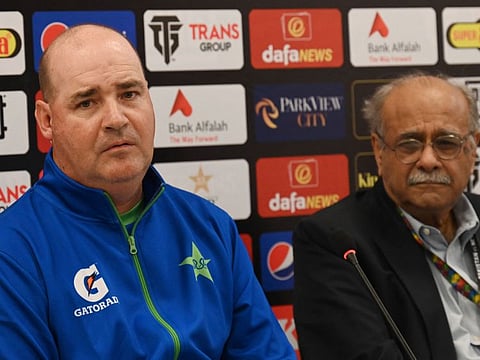 Mickey Arthur (left) and Pakistan Cricket Board's management committee chairman Najam Sethi attend a press conference in Rawalpindi on Thursday.