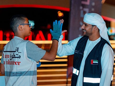 Volunteers from various nationalities pitched in to prepare the clothes for children